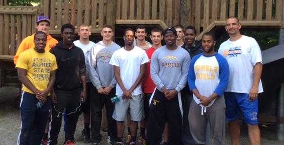 Men's Basketball Helps with Playground Rennovation