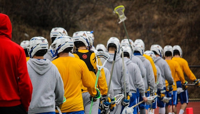 Lacrosse team heads out after warm-ups