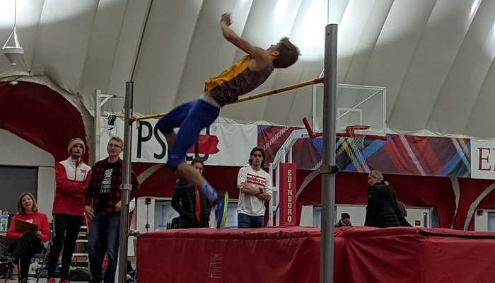 Jake Wadsworth with a leap at the high jump