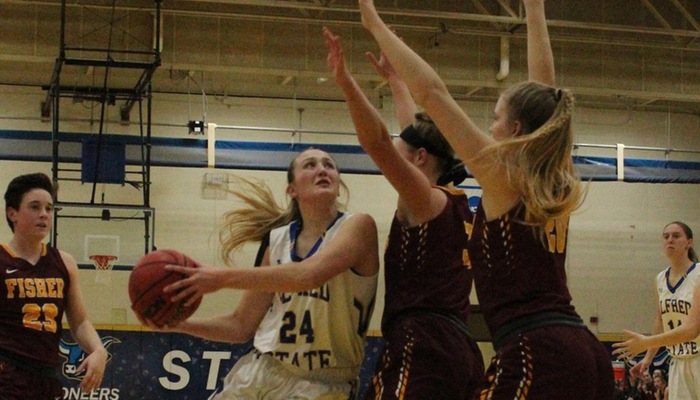 Emily Kelley drives to the hoop