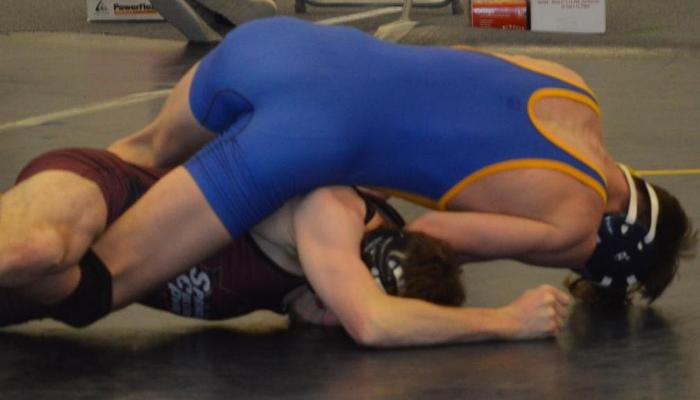 Brockport Downs Pioneers on the Mat