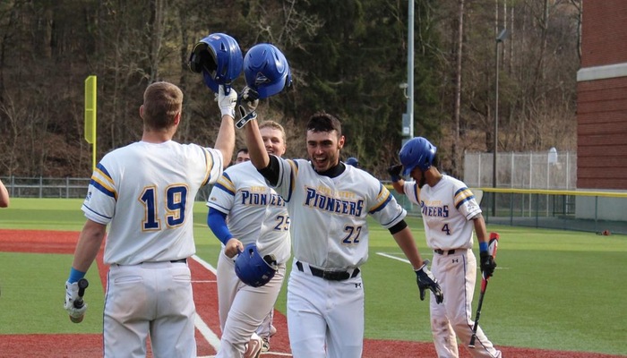 Jack Henby is congratulated after launching a three-run homer