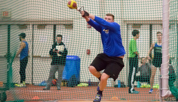 Paul Kemsley competes in the weight throw