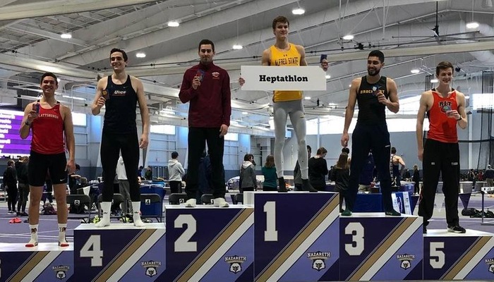 Jake Wadworth on the award stand after winning the heptathlon