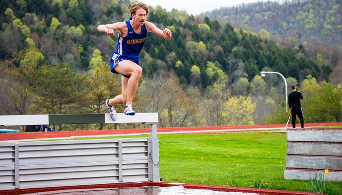 Eric Hulbert competes in the steeplechase