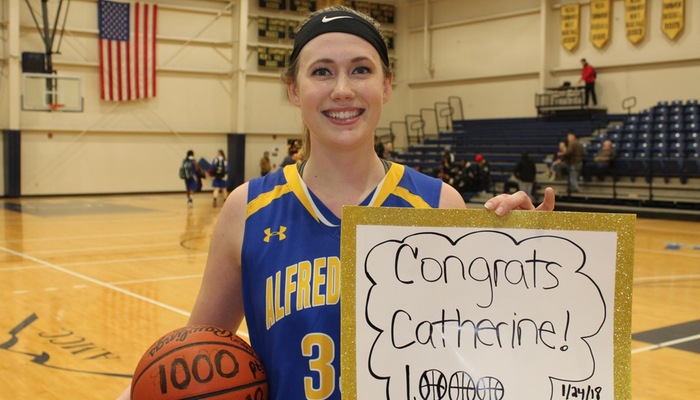 Catherine Bialecki after scoring her 1,000th point of her career