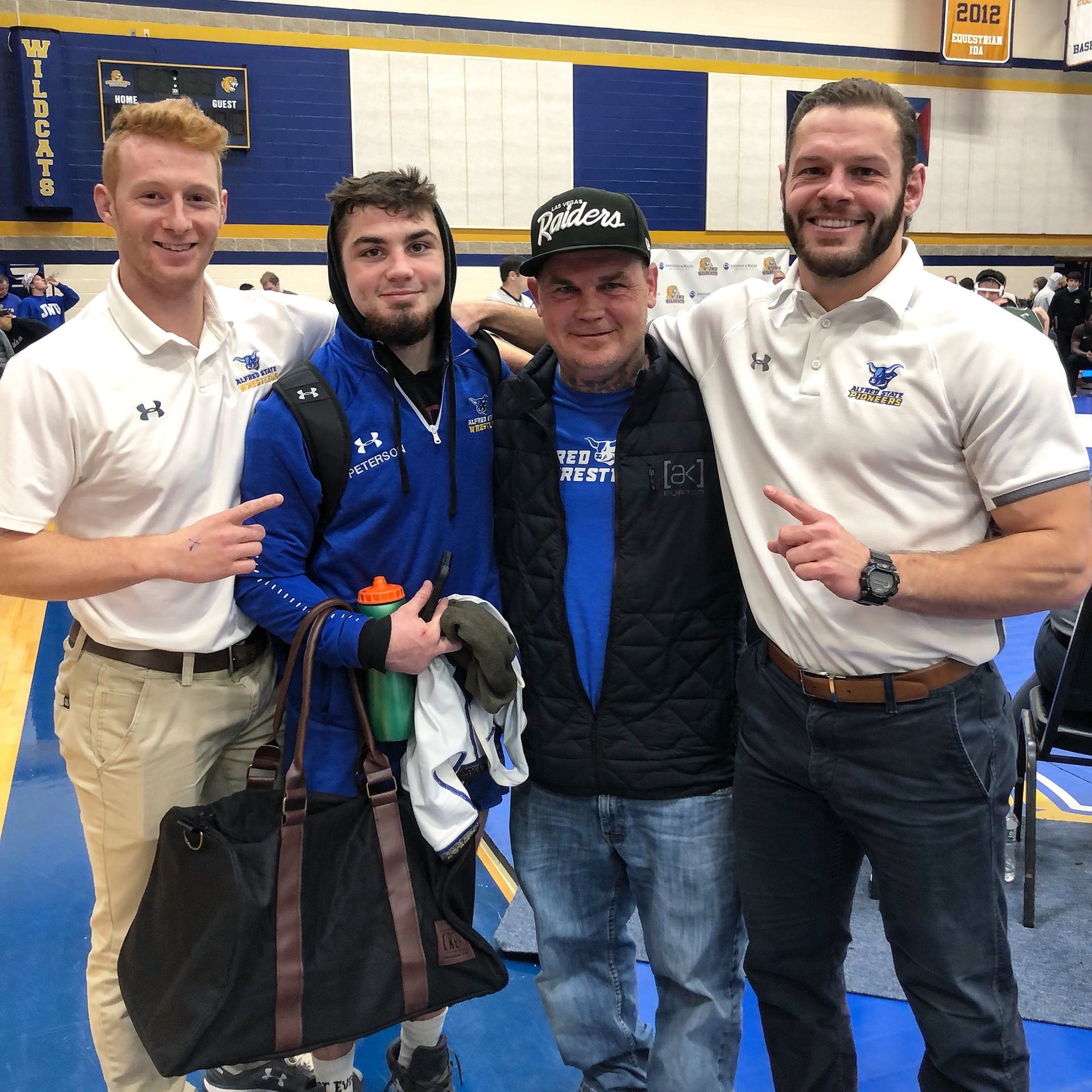 Sean Peterson, pictured with Coach Johnson, his dad (legendary MMA Referee Keith Peterson) and Coach Signorelli