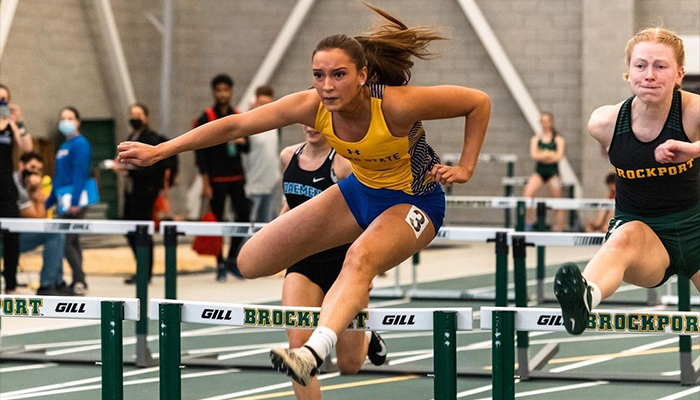 Delany Sets Program Record, Pioneers Finish Ninth at Brockport
